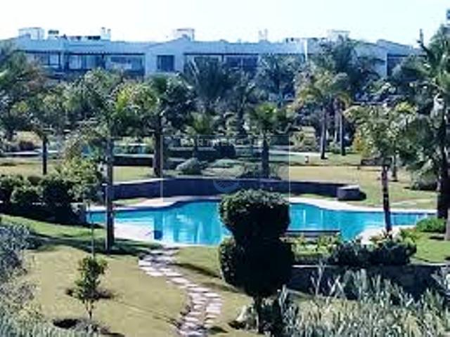 Appartement avec jardin et piscines en résidence fermée