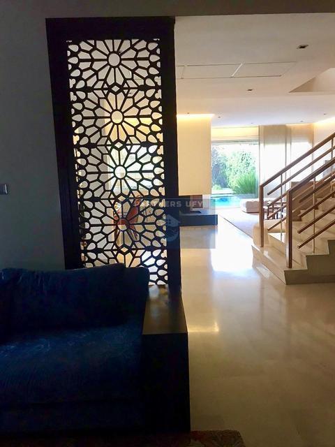 Luxueux villa avec joli jardin en résidence sécurisée - BOUSKOURA.   — 5