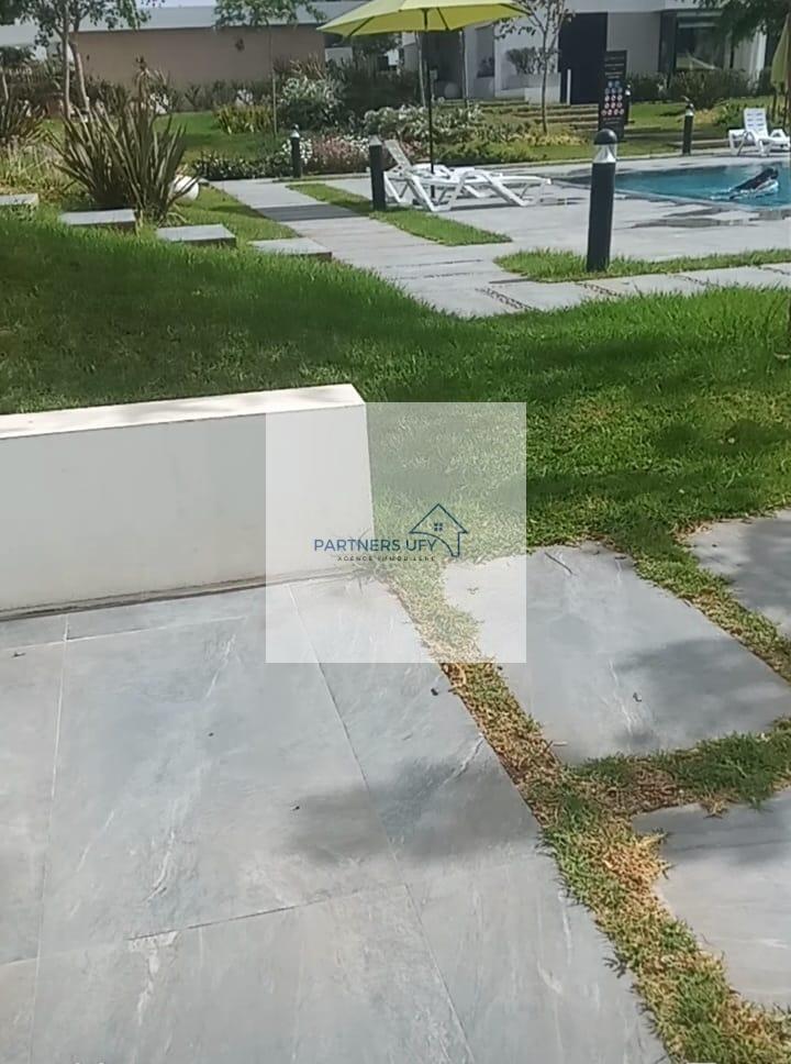 À louer : Charmant appartement avec grande terrasse à Bouskoura