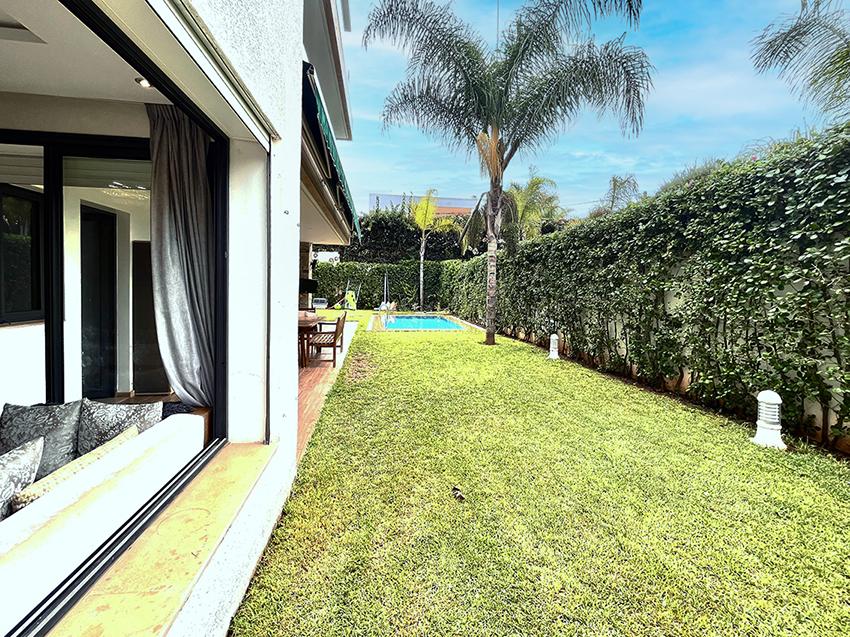 Appartement en rez-de-jardin avec piscine. — 6