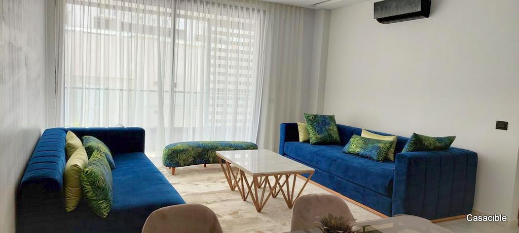 Casa Finance City: Location appartement meublé 2 chambres, terrasse.
